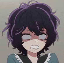 a girl with purple hair is making a funny face with her eyes closed