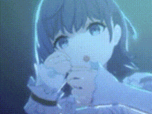 a close up of a anime girl covering her face with her hands .