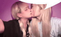 a couple of girls kissing with a speech bubble above them