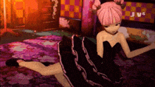 a girl in a black dress is laying on the floor with jvc written on the wall behind her