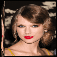 a close up of a woman 's face with red lipstick on