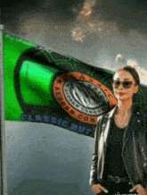 a woman wearing sunglasses stands in front of a flag that says classic but