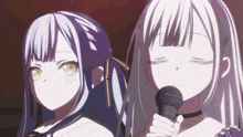 two anime girls are singing into a microphone and one has her eyes closed