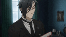 a man in a suit and tie is holding a book and says this is the only usable text we have here