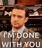 a man in a suit and tie is saying `` i 'm done with you ''