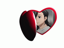 a heart shaped mirror with a picture of a man in it