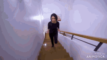 a woman is running down stairs made in animatica