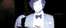 a cardboard cutout of a man in a suit with a bow tie