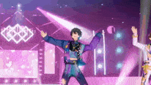 a group of anime characters are dancing on a stage in front of a purple background .