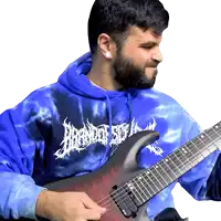 a man wearing a blue tie dye hoodie playing a guitar