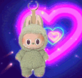 a stuffed animal in a bunny costume is standing in front of a heart