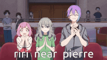 a group of anime characters are sitting in a theater with their hands folded in front of them .