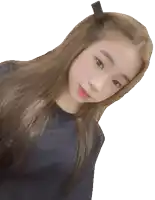 a girl with long hair and a black shirt is looking at the camera