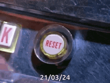 a button with the word reset on it
