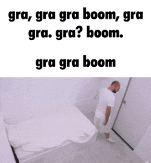 a man is standing next to a bed with the words gra gra boom written on it