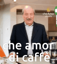 a man in a suit stands in front of a sign that says " che amor di caffe "