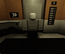 a person in an elevator with the number 39 on it