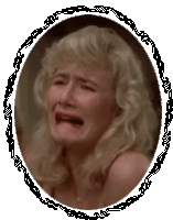a woman is crying in a picture frame with a chain around it