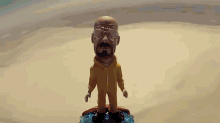 Walter White Bobblehead Floats Into Actual Space GIF - Breakingbad Walter White Bobblehead GIFs