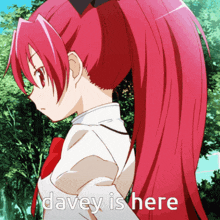 a picture of a girl with red hair and the words davey is here below her