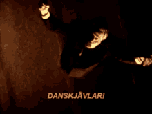 a man is flying through the air with the words danskjavlar written on the bottom