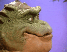 Smirk Dinosaurs GIF - Smirk Dinosaurs Jim Henson GIFs