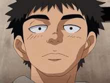a close up of a man 's face with black hair