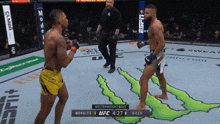 two men are fighting in a ufc match and the score is morales 1 giles 0