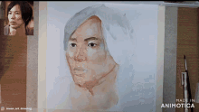 a painting of a man 's face is being made by animatica