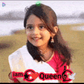 a little girl wearing a red and white dress with the words i am queen on the bottom