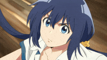 a girl with blue hair and a white shirt has a ponytail