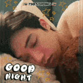 a man is sleeping in a bed with the words good night written on the bottom