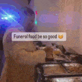 a man prepares food for a funeral with a smiley face and the words " funeral food be so good "