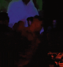 a man is dancing in front of a boiler room sign