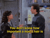 a man and a woman are talking in front of a refrigerator with a sticker that says ewr on it