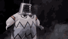 a person in an inflatable robot costume with the word evil on the bottom