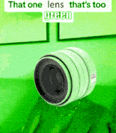 a green camera lens with the words that one lens that 's too green below it