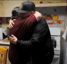 Hugging Hugs GIF - Hugging Hugs Mother And Son GIFs