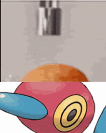 a close up of a cartoon character with a yellow circle on its face