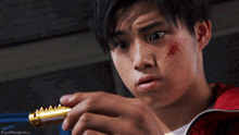 a close up of a person 's face with the words dryedmangoes.com below