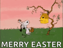 snoopy is holding an easter egg in his hand while standing next to a bird house .