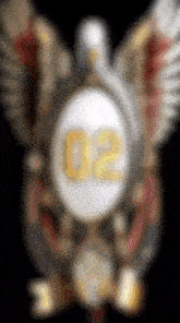a blurred image of a badge with the number 02