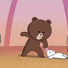 a brown teddy bear is holding a white rabbit in its hand