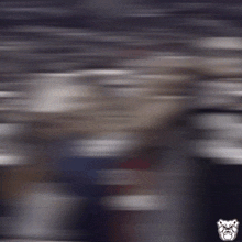 a blurry picture of a person wearing a jersey with the number 23 on it