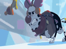a cartoon dog is running in the snow with disney written on the bottom