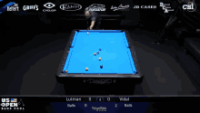 a pool table with a blue cloth and the word diamond on it
