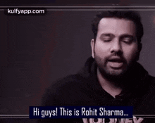 a man with a beard and a nose ring is saying hi guys this is rohit sharma