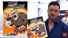 a man holds up a comic book called kids these days