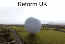 a white ball in a field with the words reform uk on top