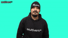 a man wearing a black beanie and a black sweatshirt with the word multivers on the bottom